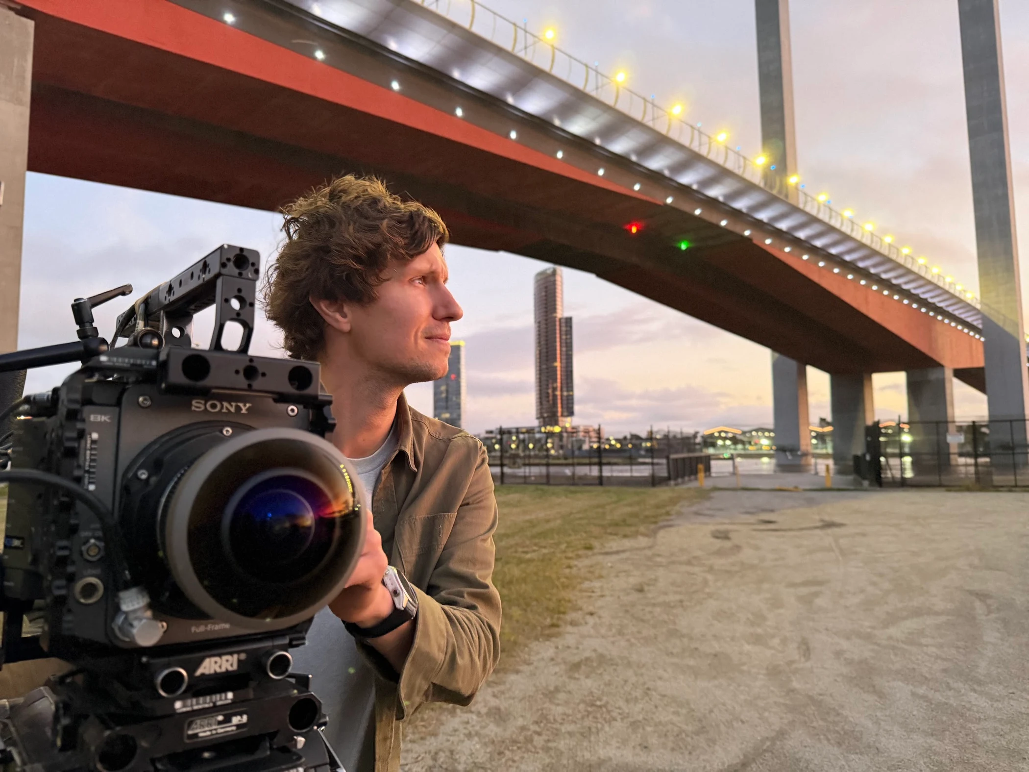 Oscar on location with a Sony cinema camera and wide-angle lens.